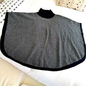 Women’s turtleneck poncho by M Oleary.